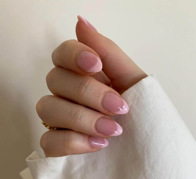 Hand with Franch manicure nail design